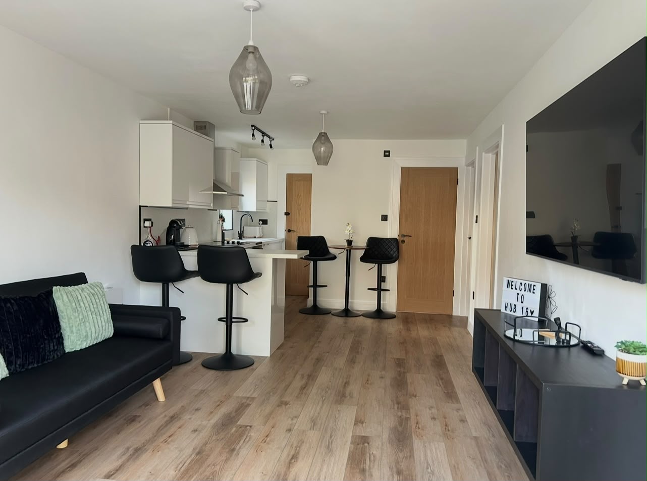 Open-plan living room and kitchen at Hub 16