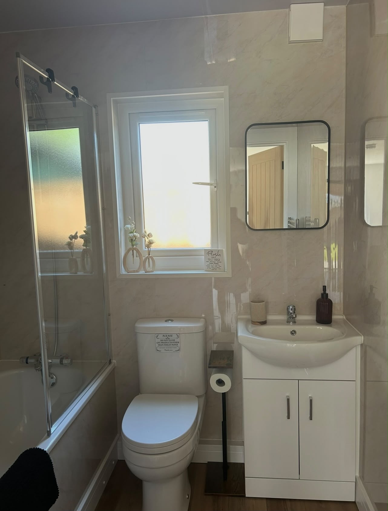 Modern bathroom with walk-in shower at Hub 16
